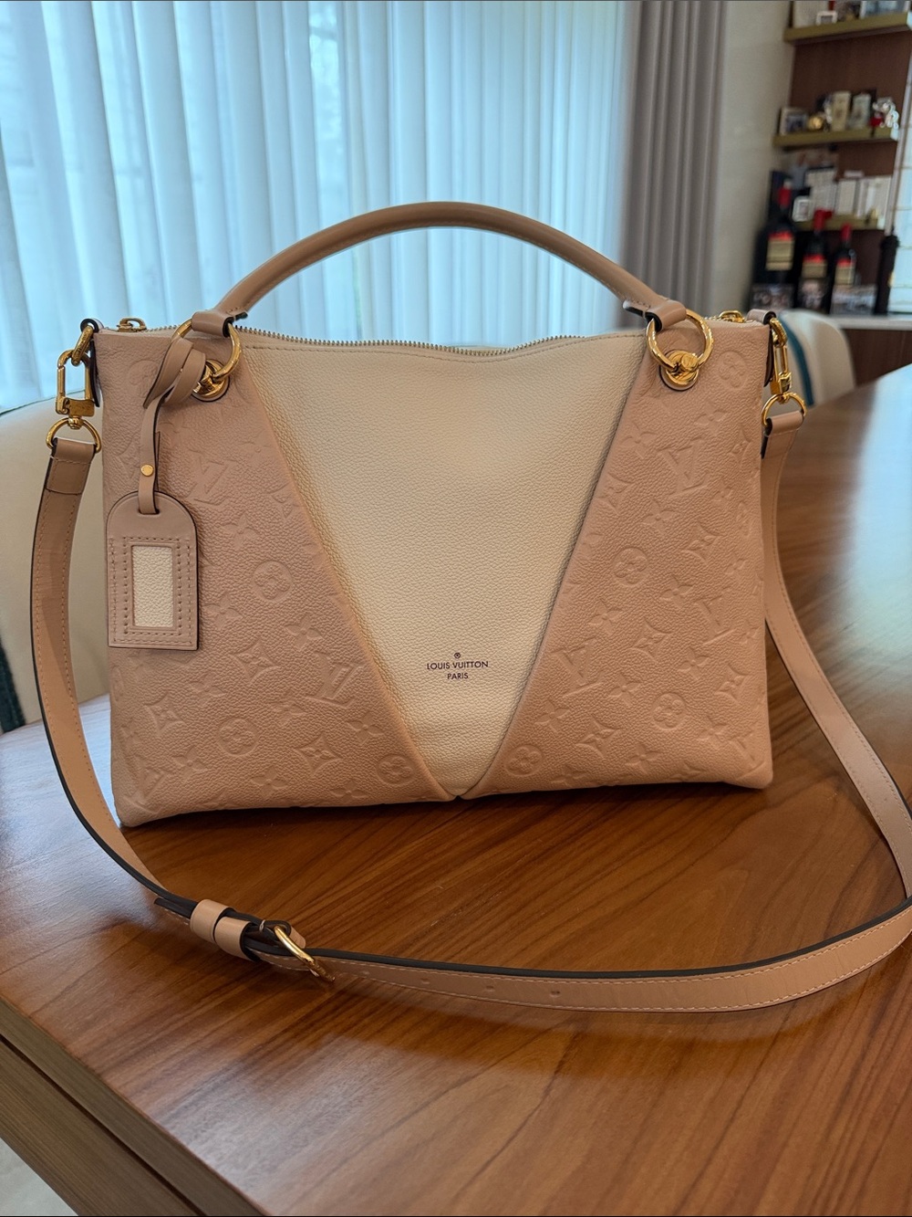 Louis Vuitton V tote monogram empreinte leather